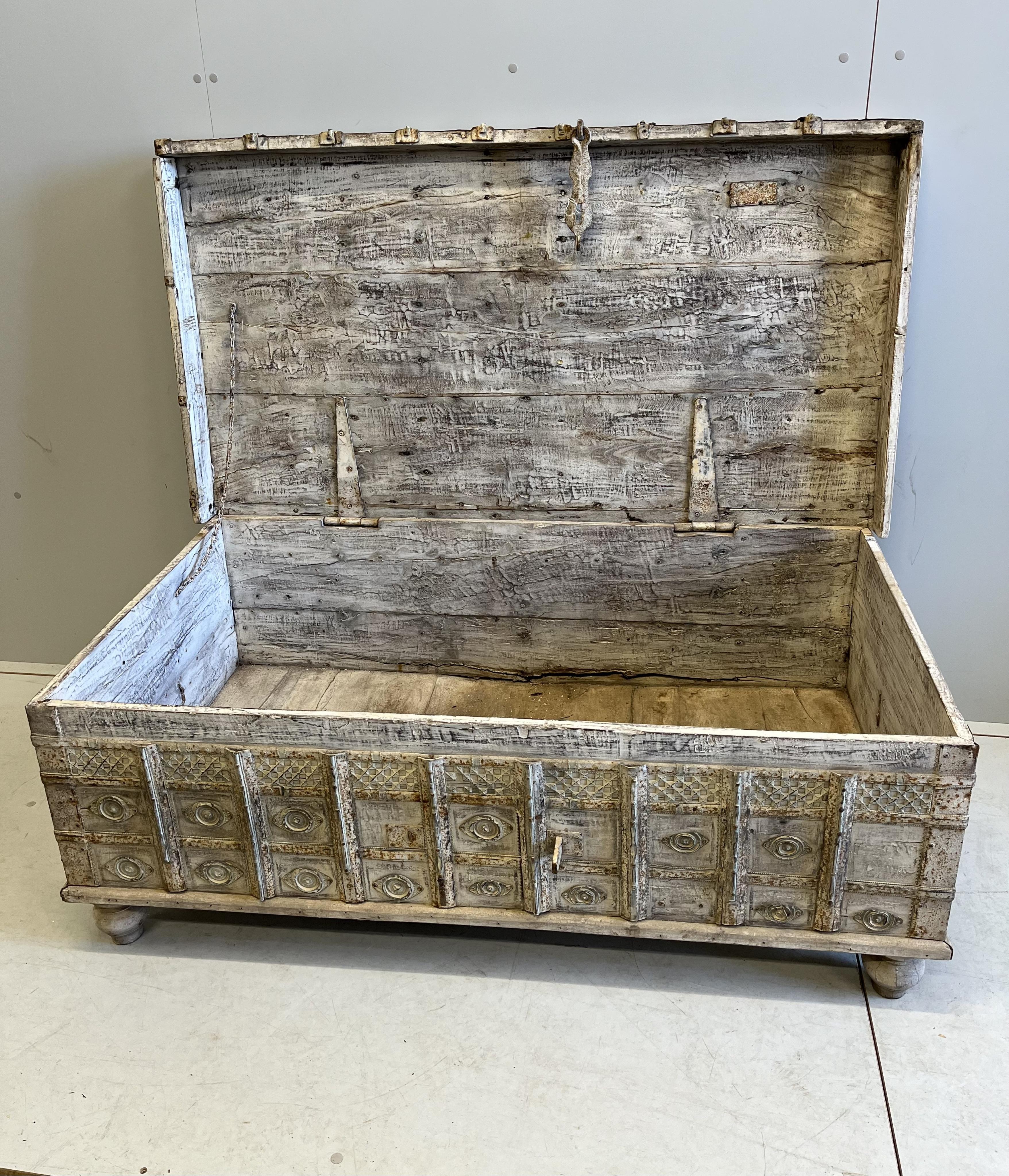 An iron bound Indian rectangular hardwood trunk, width 137cm, depth 75cm, height 50cm